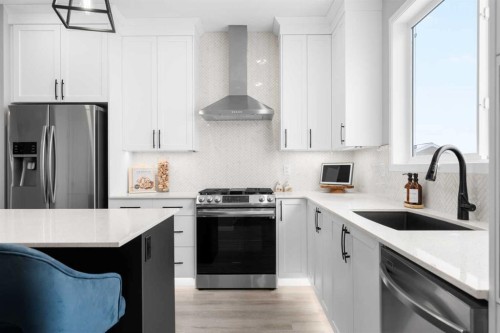 92 Wolf Gate, Okotoks, AB - Indoor Photo Showing Kitchen With Stainless Steel Kitchen With Upgraded Kitchen