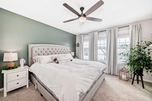 117 Sunset Common, Cochrane, AB - Indoor Photo Showing Bedroom