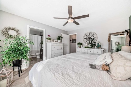 117 Sunset Common, Cochrane, AB - Indoor Photo Showing Bedroom