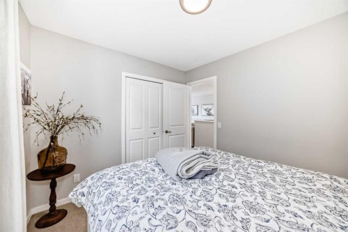 117 Sunset Common, Cochrane, AB - Indoor Photo Showing Bedroom