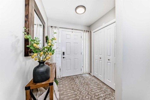 117 Sunset Common, Cochrane, AB - Indoor Photo Showing Other Room