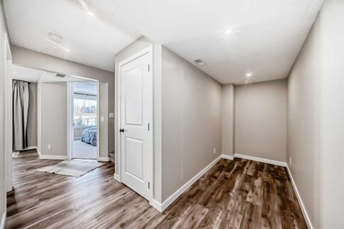 117 Sunset Common, Cochrane, AB - Indoor Photo Showing Other Room