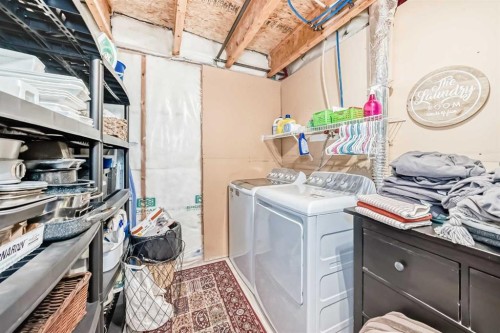 117 Sunset Common, Cochrane, AB - Indoor Photo Showing Laundry Room