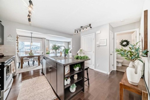 117 Sunset Common, Cochrane, AB - Indoor Photo Showing Kitchen