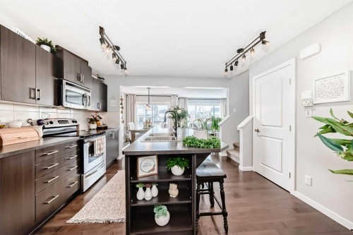 117 Sunset Common, Cochrane, AB - Indoor Photo Showing Kitchen