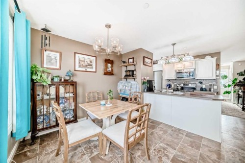 20 Mackenzie, Carstairs, AB - Indoor Photo Showing Dining Room