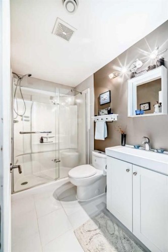 20 Mackenzie, Carstairs, AB - Indoor Photo Showing Bathroom