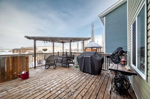 20 Mackenzie, Carstairs, AB - Outdoor With Deck Patio Veranda With Exterior