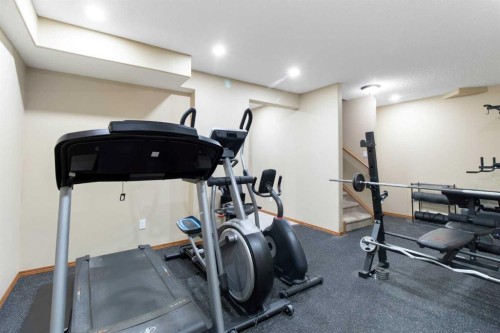 235 Everwillow Close Sw, Calgary, AB - Indoor Photo Showing Gym Room