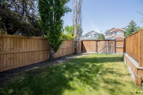 235 Everwillow Close Sw, Calgary, AB - Outdoor With Backyard