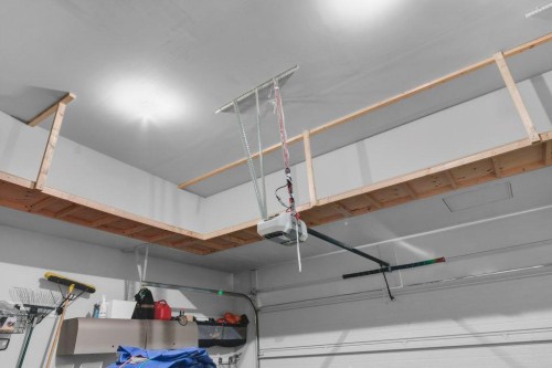 2235 Brightoncrest Green Se, Calgary, AB - Indoor Photo Showing Garage