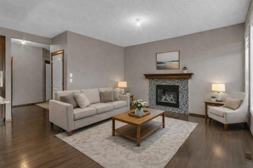 2235 Brightoncrest Green Se, Calgary, AB - Indoor Photo Showing Living Room With Fireplace