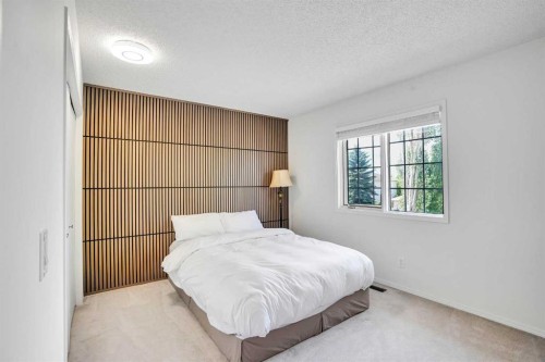 73 Riverview Close Se, Calgary, AB - Indoor Photo Showing Bedroom