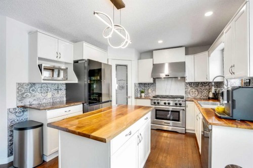 73 Riverview Close Se, Calgary, AB - Indoor Photo Showing Kitchen With Stainless Steel Kitchen With Upgraded Kitchen