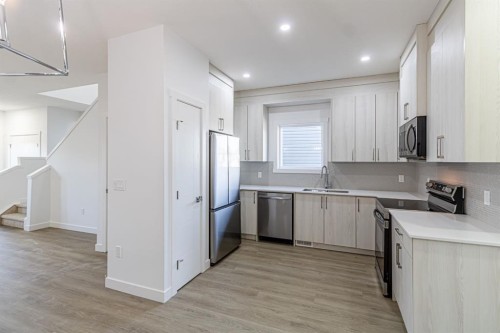 304 Cornerbrook Drive Ne, Calgary, AB - Indoor Photo Showing Kitchen With Upgraded Kitchen