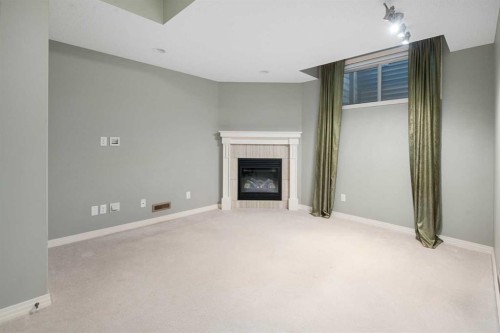 53 Sage Bank Link Nw, Calgary, AB - Indoor With Fireplace