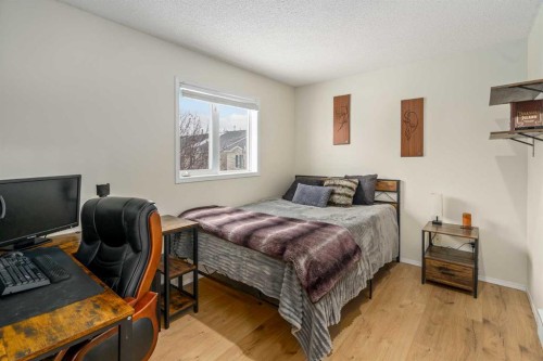 76 Sunlake Gardens Se, Calgary, AB - Indoor Photo Showing Bedroom
