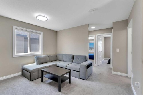 521 Corner Meadows Way Ne, Calgary, AB - Indoor Photo Showing Living Room