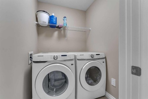521 Corner Meadows Way Ne, Calgary, AB - Indoor Photo Showing Laundry Room