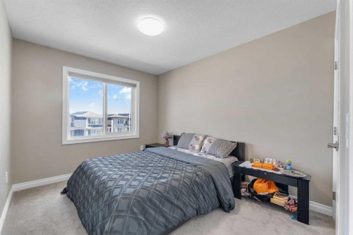 521 Corner Meadows Way Ne, Calgary, AB - Indoor Photo Showing Bedroom