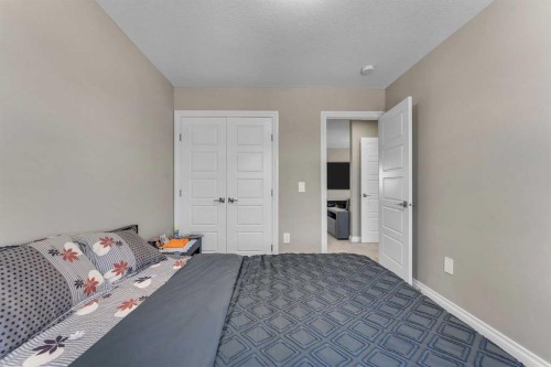 521 Corner Meadows Way Ne, Calgary, AB - Indoor Photo Showing Bedroom