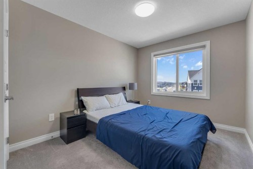 521 Corner Meadows Way Ne, Calgary, AB - Indoor Photo Showing Bedroom