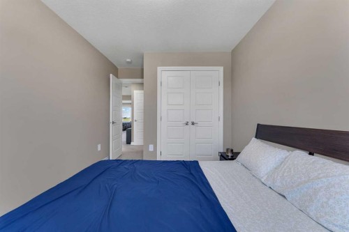 521 Corner Meadows Way Ne, Calgary, AB - Indoor Photo Showing Bedroom
