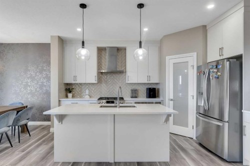 521 Corner Meadows Way Ne, Calgary, AB - Indoor Photo Showing Kitchen With Upgraded Kitchen