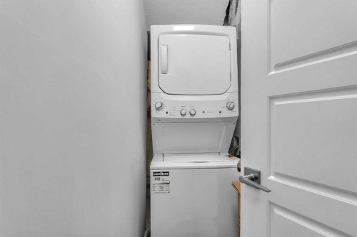521 Corner Meadows Way Ne, Calgary, AB - Indoor Photo Showing Laundry Room