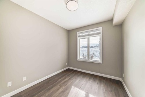 110-1005A Westmount Drive, Strathmore, AB - Indoor Photo Showing Other Room