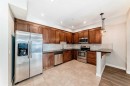 110-1005A Westmount Drive, Strathmore, AB  - Indoor Photo Showing Kitchen 