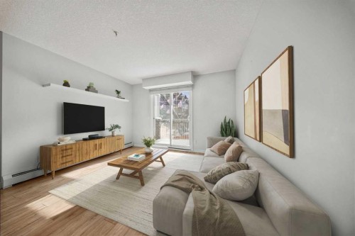 2223-115 Prestwick Villas Se, Calgary, AB - Indoor Photo Showing Living Room
