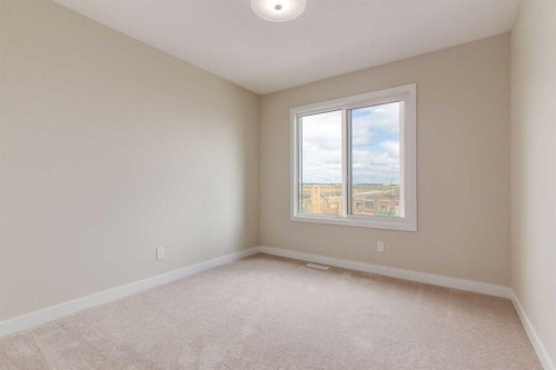 128 Heartwood Lane Se, Calgary, AB - Indoor Photo Showing Other Room