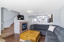 96 Auburn Bay Boulevard Se, Calgary, AB  - Indoor Photo Showing Living Room With Fireplace 