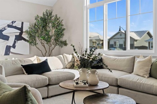 47 Sundown Crescent, Cochrane, AB - Indoor Photo Showing Living Room