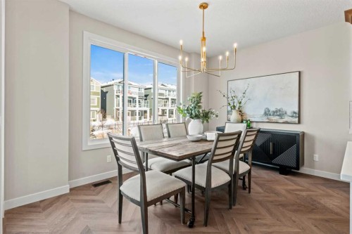 47 Sundown Crescent, Cochrane, AB - Indoor Photo Showing Dining Room
