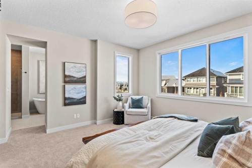 47 Sundown Crescent, Cochrane, AB - Indoor Photo Showing Bedroom