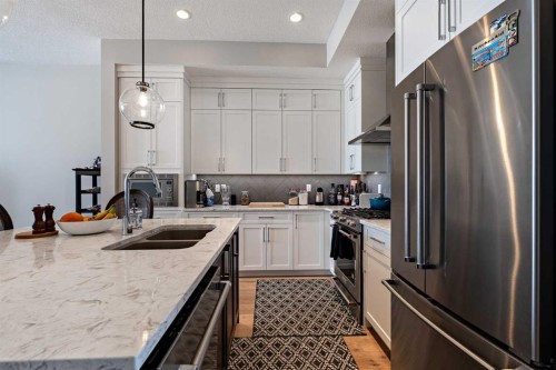 80 Mahogany Gardens Se, Calgary, AB - Indoor Photo Showing Kitchen With Double Sink With Upgraded Kitchen