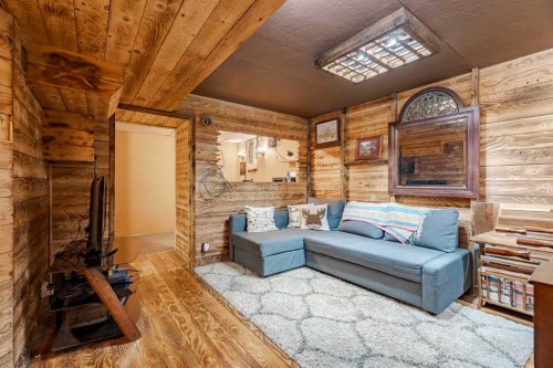 3124 14 Street Nw, Calgary, AB - Indoor Photo Showing Living Room With Fireplace