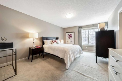 78 Ypres Green Sw, Calgary, AB - Indoor Photo Showing Bedroom