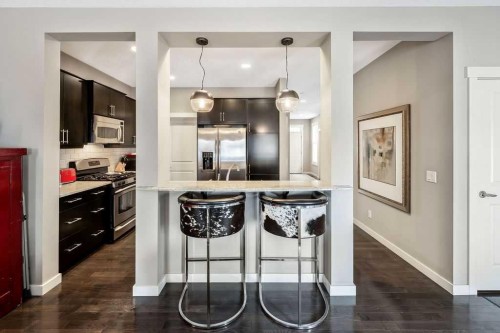 78 Ypres Green Sw, Calgary, AB - Indoor Photo Showing Kitchen With Upgraded Kitchen