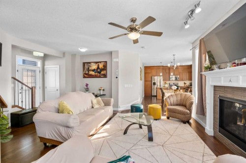 8487 Saddlebrook Drive Ne, Calgary, AB - Indoor Photo Showing Living Room With Fireplace