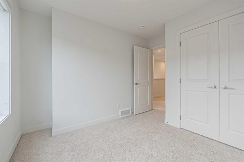101-550 Seton Circle Se, Calgary, AB - Indoor Photo Showing Other Room