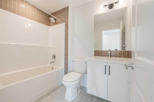 101-550 Seton Circle Se, Calgary, AB - Indoor Photo Showing Bathroom