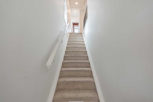 101-550 Seton Circle Se, Calgary, AB - Indoor Photo Showing Other Room