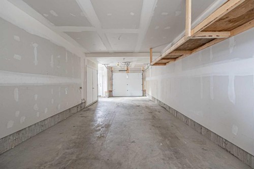 101-550 Seton Circle Se, Calgary, AB - Indoor Photo Showing Garage