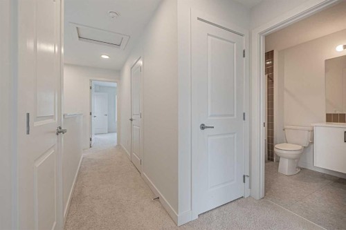 101-550 Seton Circle Se, Calgary, AB - Indoor Photo Showing Other Room