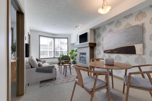 210-2420 34 Avenue Sw, Calgary, AB - Indoor With Fireplace