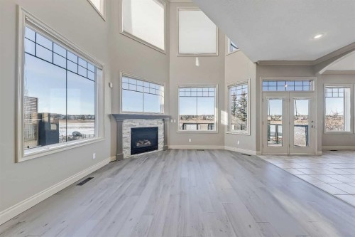 169 Cove Road, Chestermere, AB - Indoor With Fireplace
