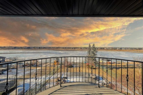 169 Cove Road, Chestermere, AB - Outdoor With Body Of Water With Balcony With View